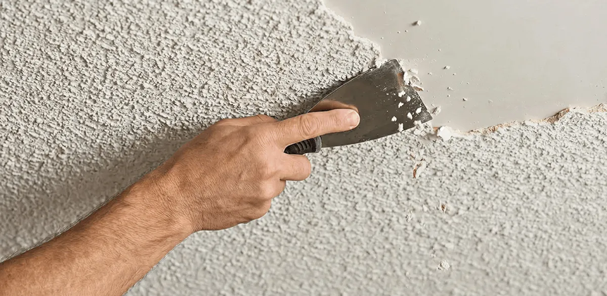 Popcorn ceiling removal scraping off textured ceiling finish in Pasadena, CA