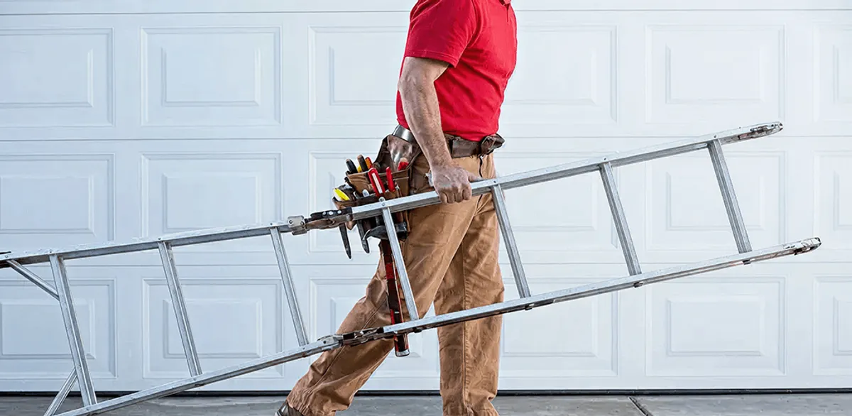 Garage door repair technician arriving with tools and ladder in Pasadena, CA