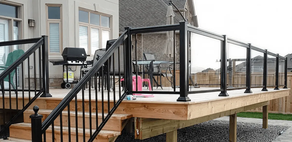 Handrail installation on a deck staircase for safety and code compliance in Pasadena, CA